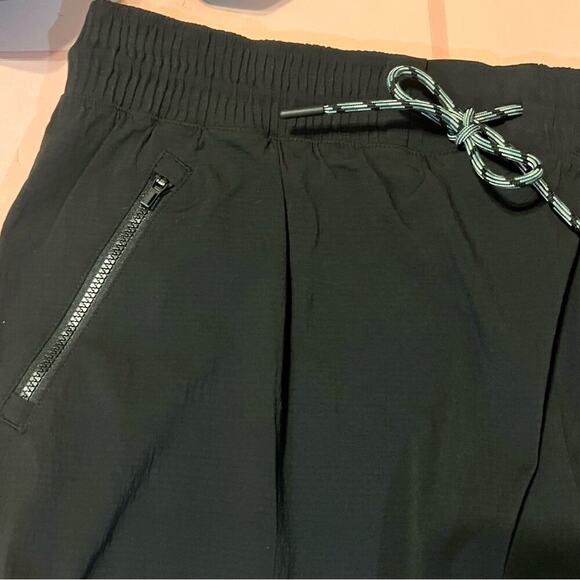Athleta Black Trekkie Active Skirt Workout Zipper Pockets Drawstring Women's 10 - Picture 3 of 8